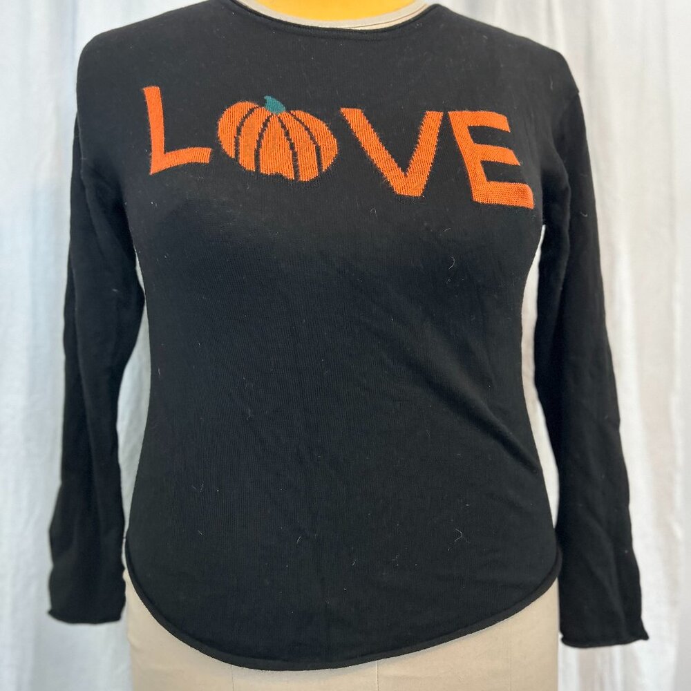 Black fall pumpkin sweater from Racheal Zoe